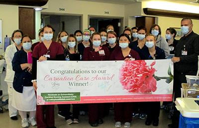 Carnation Care Award given to Bich Ngoe Vo